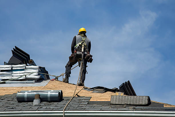 Professional Roofing technician working in Highland, AR